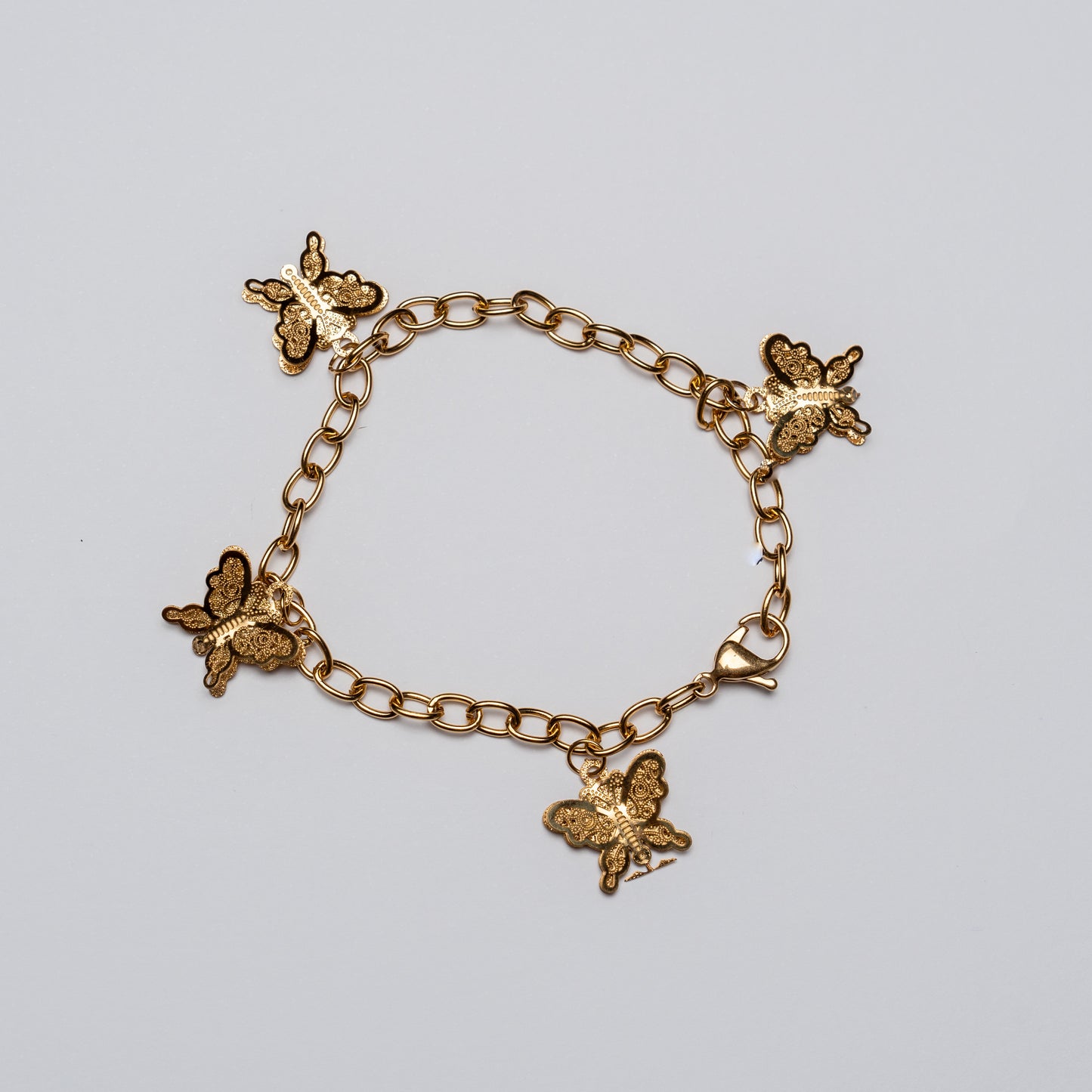 Pulsera Dorada con Encantos de Mariposa